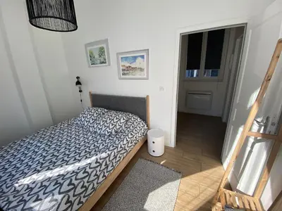 Un ou plusieurs lits dans un hébergement de l'établissement Appartement Rez de chaussé