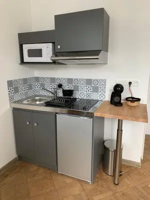 Cuisine ou kitchenette dans l'établissement LA BERGE