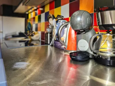 Cuisine ou kitchenette dans l'établissement Cosy'Appart - LE GERVAIS