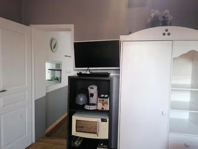 Cuisine ou kitchenette dans l'établissement Charmant Appartement 10mn Rouen