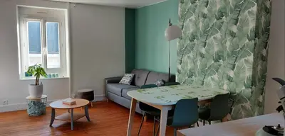 Coin salon dans l'établissement Duplex - En plein Centre Ville - 6 pers
