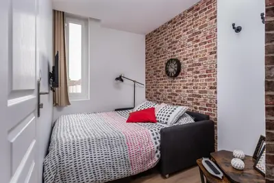 Un ou plusieurs lits dans un hébergement de l'établissement Location d'appartements - Cosysejour - Calme Fibre Netflix