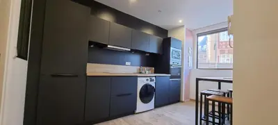 Cuisine ou kitchenette dans l'établissement Le Faubourg Dieppe