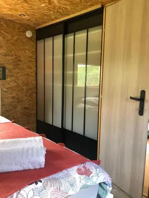 Un ou plusieurs lits dans un hébergement de l'établissement Le Cottage des Hortillonnages