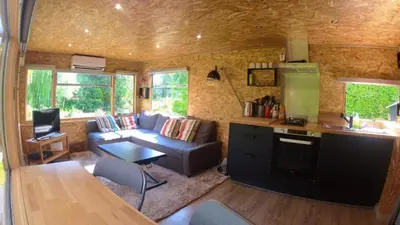 Coin salon dans l'établissement Le Cottage des Hortillonnages