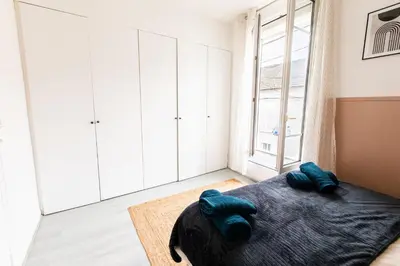 Un ou plusieurs lits dans un hébergement de l'établissement ****ChillChic/Espaces Verts/Centre Ville/Paris****