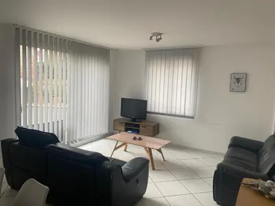Télévision ou salle de divertissement dans l'établissement Maison Bord de Mer