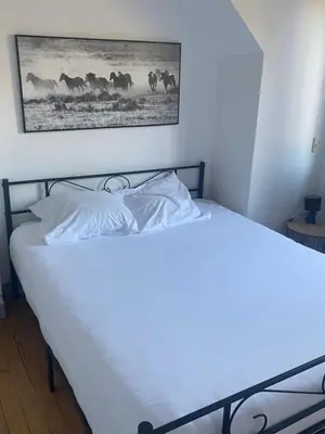 Un ou plusieurs lits dans un hébergement de l'établissement Maison Bord de Mer