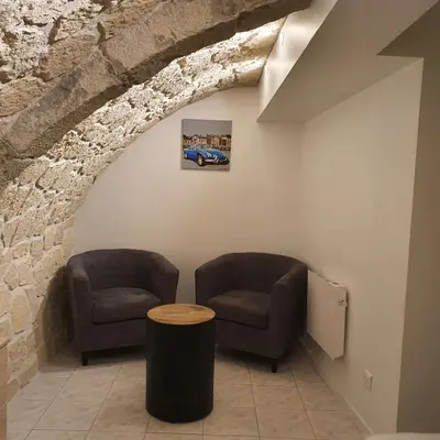 Coin salon dans l'établissement Le Saint Jean Ma Ge