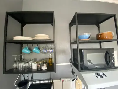 Cuisine ou kitchenette dans l'établissement Petit studio confortable pour deux personnes - 037
