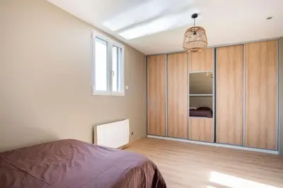 Un ou plusieurs lits dans un hébergement de l'établissement Villa des Vergers