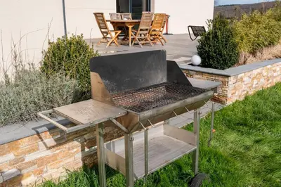 Barbecue disponible mis à disposition des clients de la villa