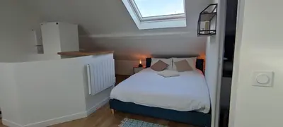 Un ou plusieurs lits dans un hébergement de l'établissement Grand LOFT à Poissy