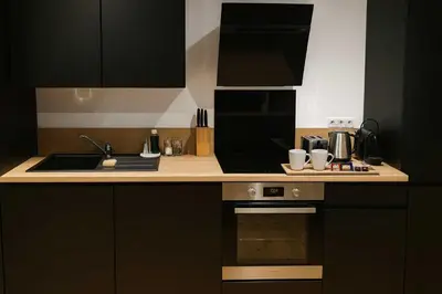 Cuisine ou kitchenette dans l'établissement White House Dhavernas - Résidence Privée - Amiens - Parking Gratuit