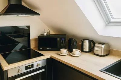 Cuisine ou kitchenette dans l'établissement White House Dhavernas - Résidence Privée - Amiens - Parking Gratuit