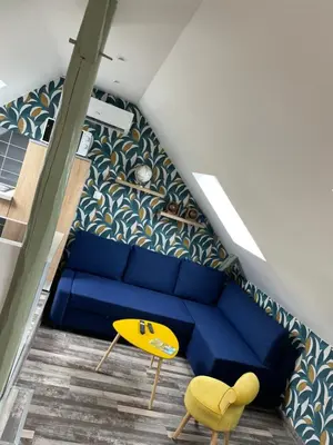 Coin salon dans l'établissement L’Auberge de papa