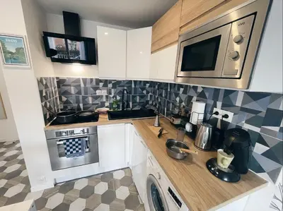 Cuisine ou kitchenette dans l'établissement NEW: appartement tout confort + parking gratuit