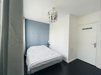 Un ou plusieurs lits dans un hébergement de l'établissement NEW: appartement tout confort + parking gratuit