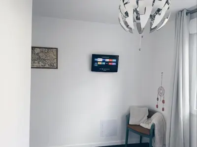 Télévision ou salle de divertissement dans l'établissement NEW: appartement tout confort + parking gratuit
