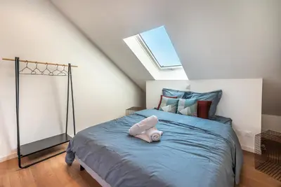 Un ou plusieurs lits dans un hébergement de l'établissement DOWNTOWN LOFT - CENTRE VILLE - WiFi - NETFLIX