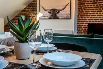 Coin salon dans l'établissement DOWNTOWN LOFT - CENTRE VILLE - WiFi - NETFLIX