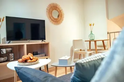Télévision ou salle de divertissement dans l'établissement Vernon : La Marinière