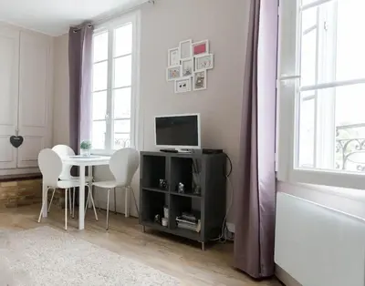 Télévision ou salle de divertissement dans l'établissement VUE PORT 