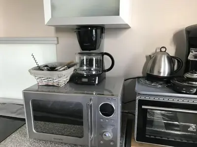 Cuisine ou kitchenette dans l'établissement VUE PORT 