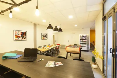 Télévision ou salle de divertissement dans l'établissement Résidence Nemea Amiens Beffroi