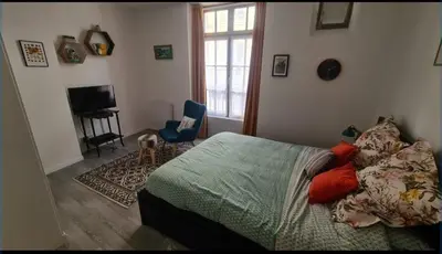 Un ou plusieurs lits dans un hébergement de l'établissement Le Dieppois BY HOLIDIEPPE