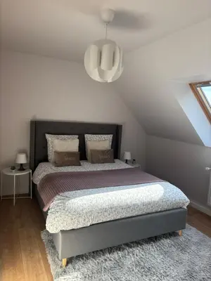 Un ou plusieurs lits dans un hébergement de l'établissement Maison Design entre Paris, Deauville et Rouen