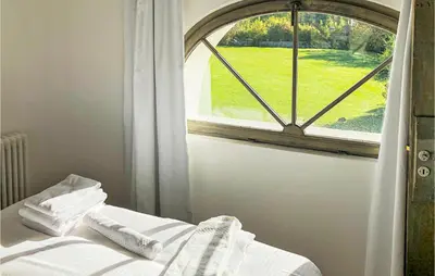 Un ou plusieurs lits dans un hébergement de l'établissement Cozy Home In Saint-Cyr-En-Arthies
