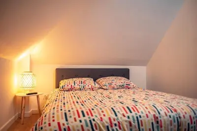 Un ou plusieurs lits dans un hébergement de l'établissement Vernon, Le Pacia