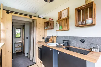 Cuisine ou kitchenette dans l'établissement Tiny House Centre équestre - 35 mins de Paris