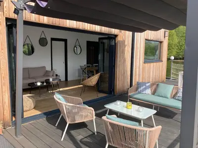 Coin salon dans l'établissement SeineHouse - Maison flottante (HouseBoat) - Séjour magique sur l'eau