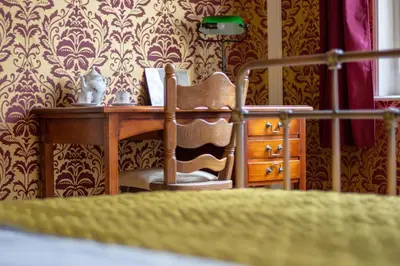 Un ou plusieurs lits dans un hébergement de l'établissement Sfeervolle b&b Le Moulin de la Place