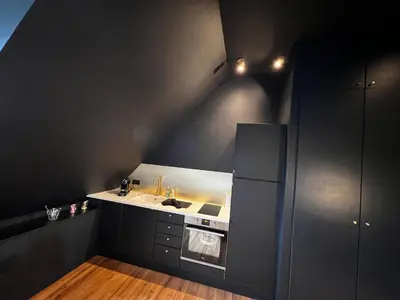 Cuisine ou kitchenette dans l'établissement LA SUITE ISAHORA. Les Locations ISAHORA c'est aussi plusieurs appart' de Standing à 2 pas du Château d'Eu, des Falaises du Tréport, de MERS les Bains et Aux portes de la BAIE DE SOMME