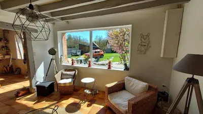 Coin salon dans l'établissement La maison aux oiseaux