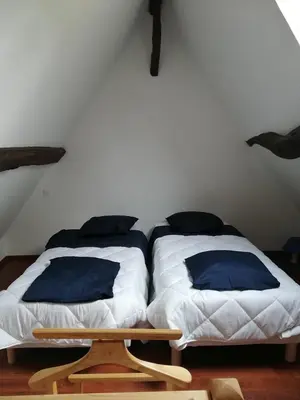 Un ou plusieurs lits dans un hébergement de l'établissement Le gîte de Vascœuil