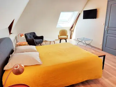 Un ou plusieurs lits dans un hébergement de l'établissement LES JACQUEMARTS NORMANDS Maison d'hôtes - Guesthouse