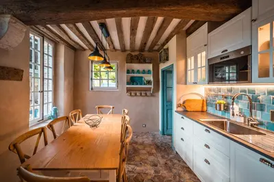 Cuisine ou kitchenette dans l'établissement Maison du Chapelain