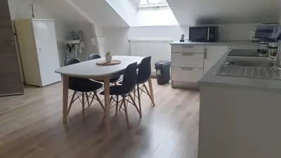 Cuisine ou kitchenette dans l'établissement Le Gîte du Val de Noye