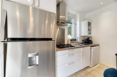 Cuisine ou kitchenette dans l'établissement Le Clos des Roches