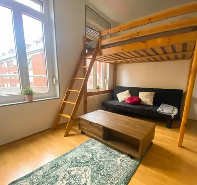 Un ou plusieurs lits dans un hébergement de l'établissement Bienvenue dans le centre ville d’Amiens