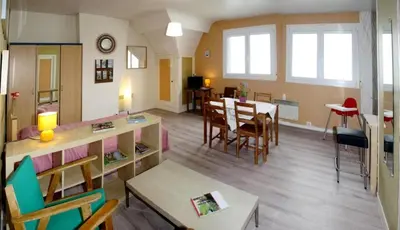 Coin salon dans l'établissement Villa Normande