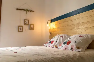 Un ou plusieurs lits dans un hébergement de l'établissement Gîte LE CLOS DES MIGRATEURS