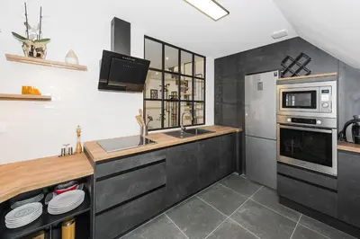 Cuisine ou kitchenette dans l'établissement l'authentique en hyper centre ville
