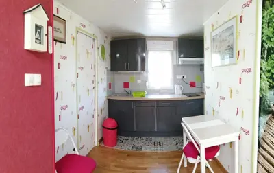 Cuisine ou kitchenette dans l'établissement Gîte Les Bignones