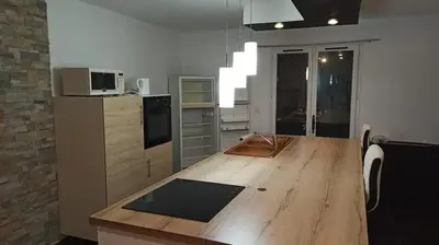 Cuisine ou kitchenette dans l'établissement chez anita
