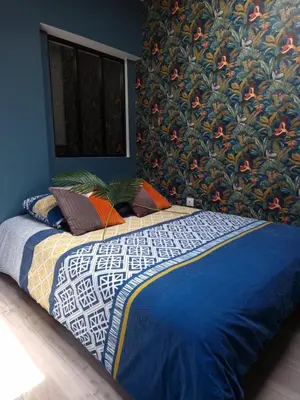 Un ou plusieurs lits dans un hébergement de l'établissement Studio Eden Jacuzzi